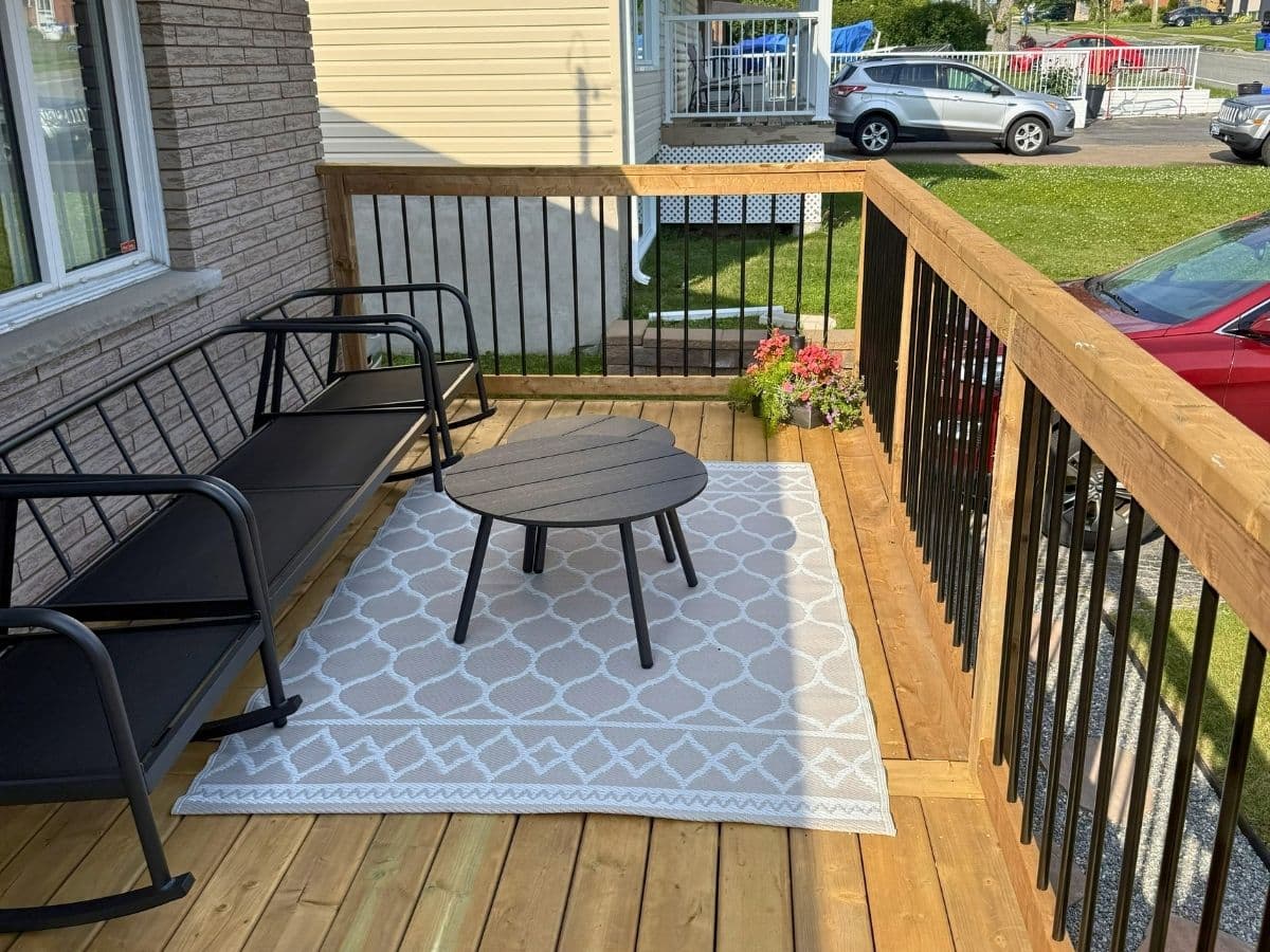 Completed custom deck framing and railing work